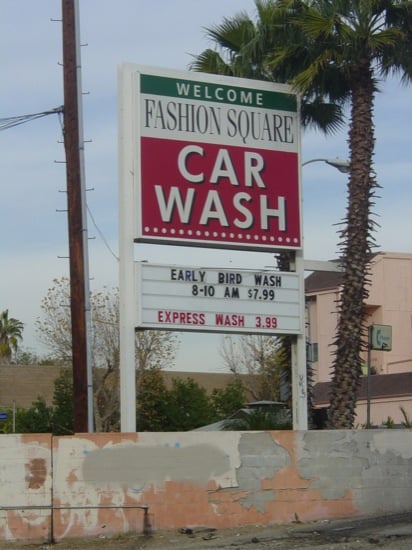 outdated car wash sign